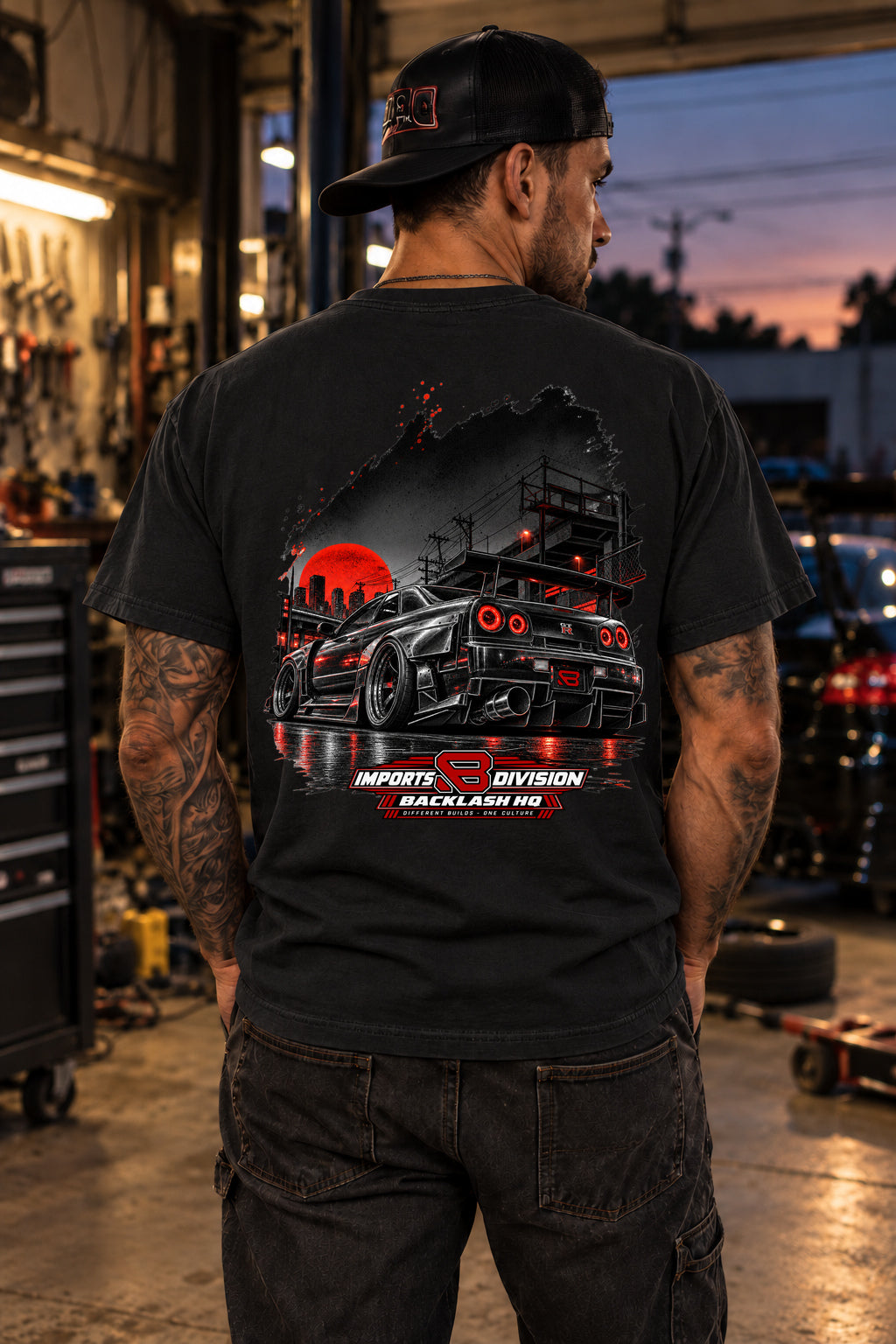 Male model showing the back of the black Backlash GT-R Imports T-Shirt | Comfort Colors 1717, original artwork