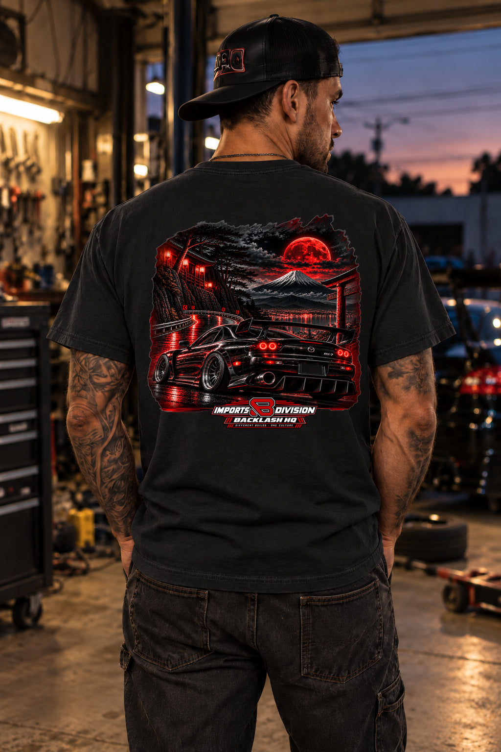 Male model showing the back of the black RX-7 Imports T-Shirt – Late Nights Good Times | Backlash HQ, original artwork